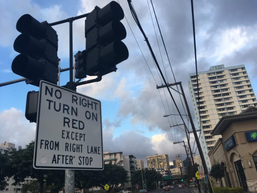 No Right Turn on Red sign at traffic light in Honolulu, Hawaii.