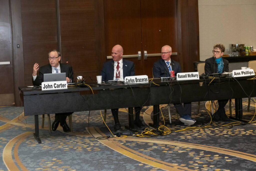 John Carter of TCGen, Carlos Braceras of Utah Department of Transportation, Russell McMurray of Georgia Department of Transportation, and Read Admiral Ann Phillips of U.S. Maritime Administration at the 2025 TRB Annual Meeting Policy Session.
