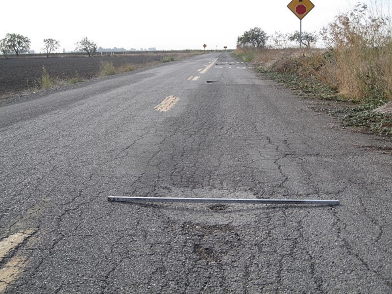 Gauge measuring rutting in low-volume road pavement