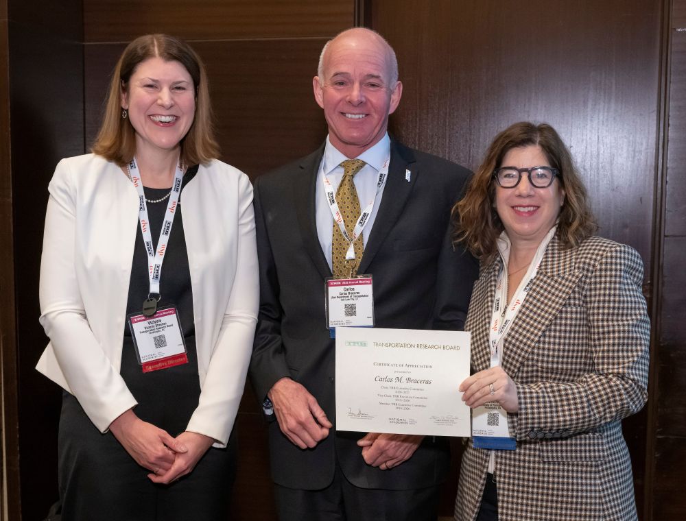 Carlos Braceras between Victoria Sheehan and Leslie Richards