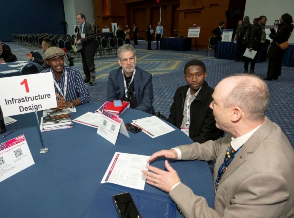 New attendees and committee chair at roundtable